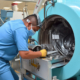 Service technician repairing an MRI machine at a hospital